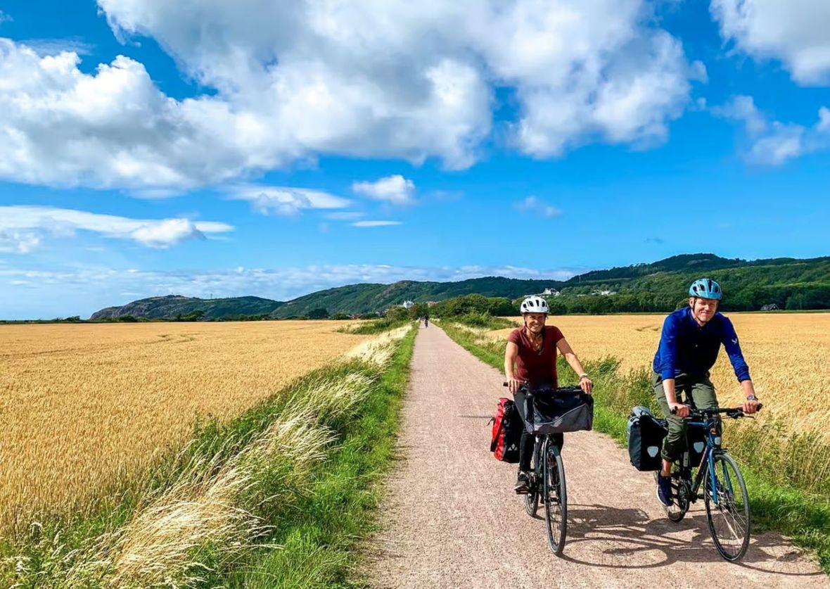 Two cyclists on rural pathway