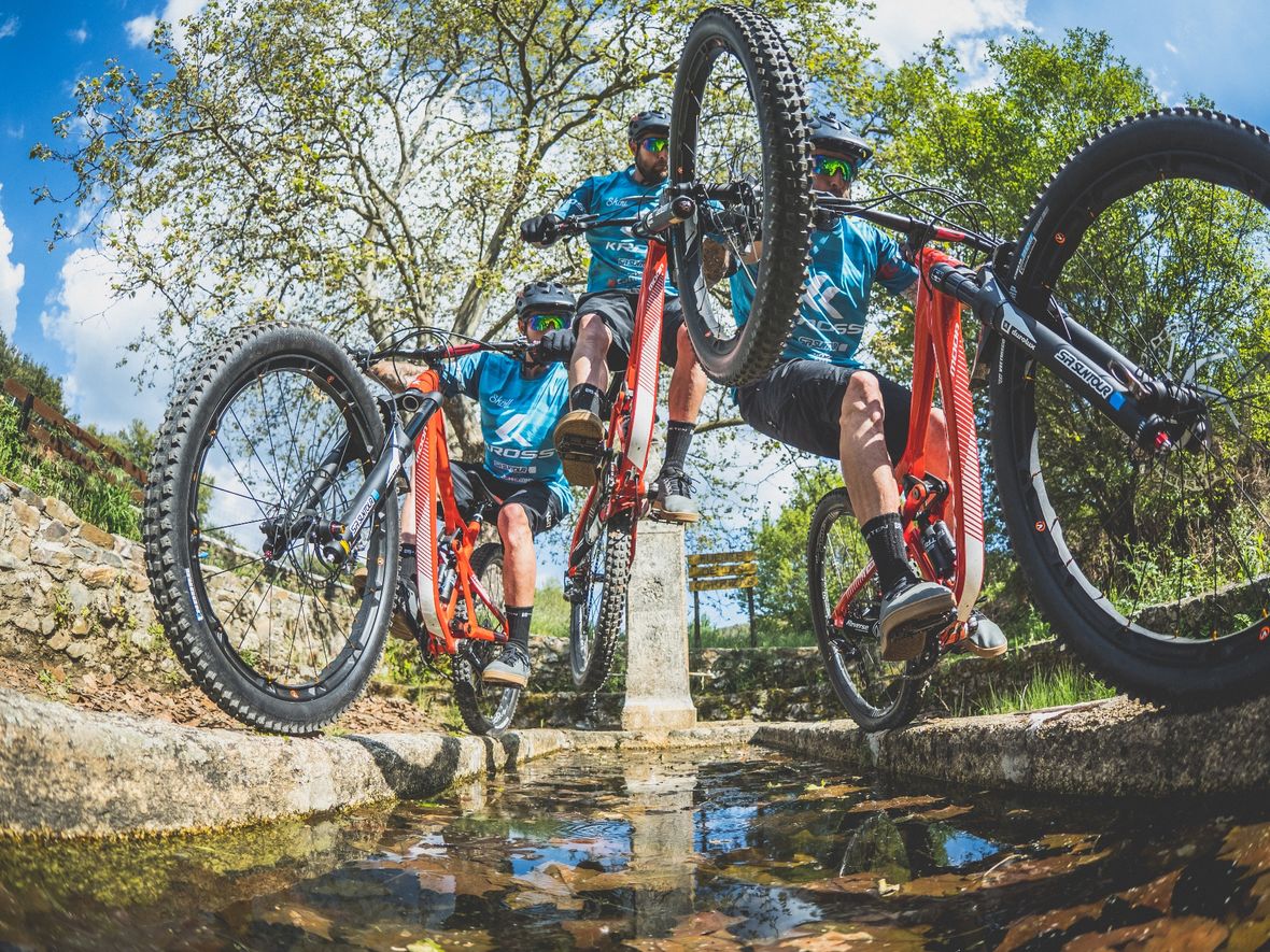 A sequence hopping over an old water feature.