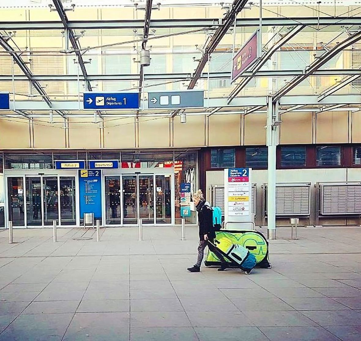 EVOC bike case carried at an airport by German mountain biker, Julia Hofmann. Photo: EVOC.