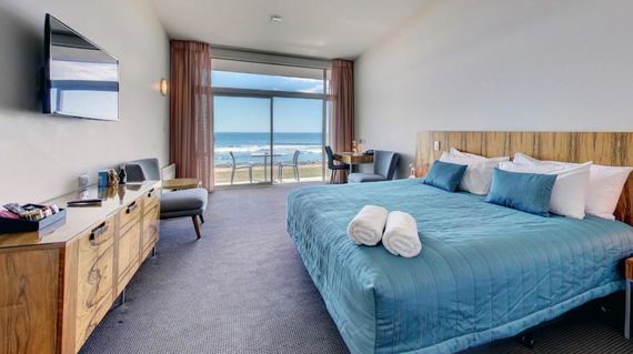 Spend comfortable nights here in an ocean view room in the heart of the town
