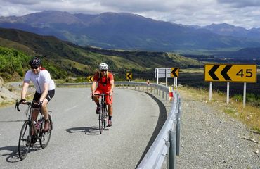 Cyclists on winding rural road
