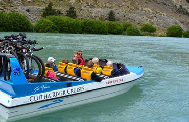 People and bikes on a jet boat