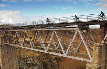 Cyclists on rail bridge
