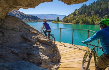 Cycling a trail round turquoise waters