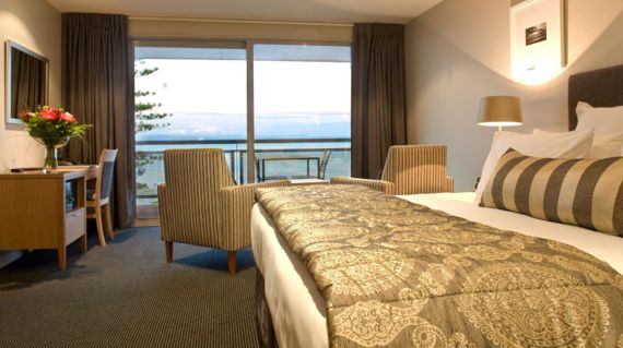 Sleep in premium accommodation and wake up to coastal views