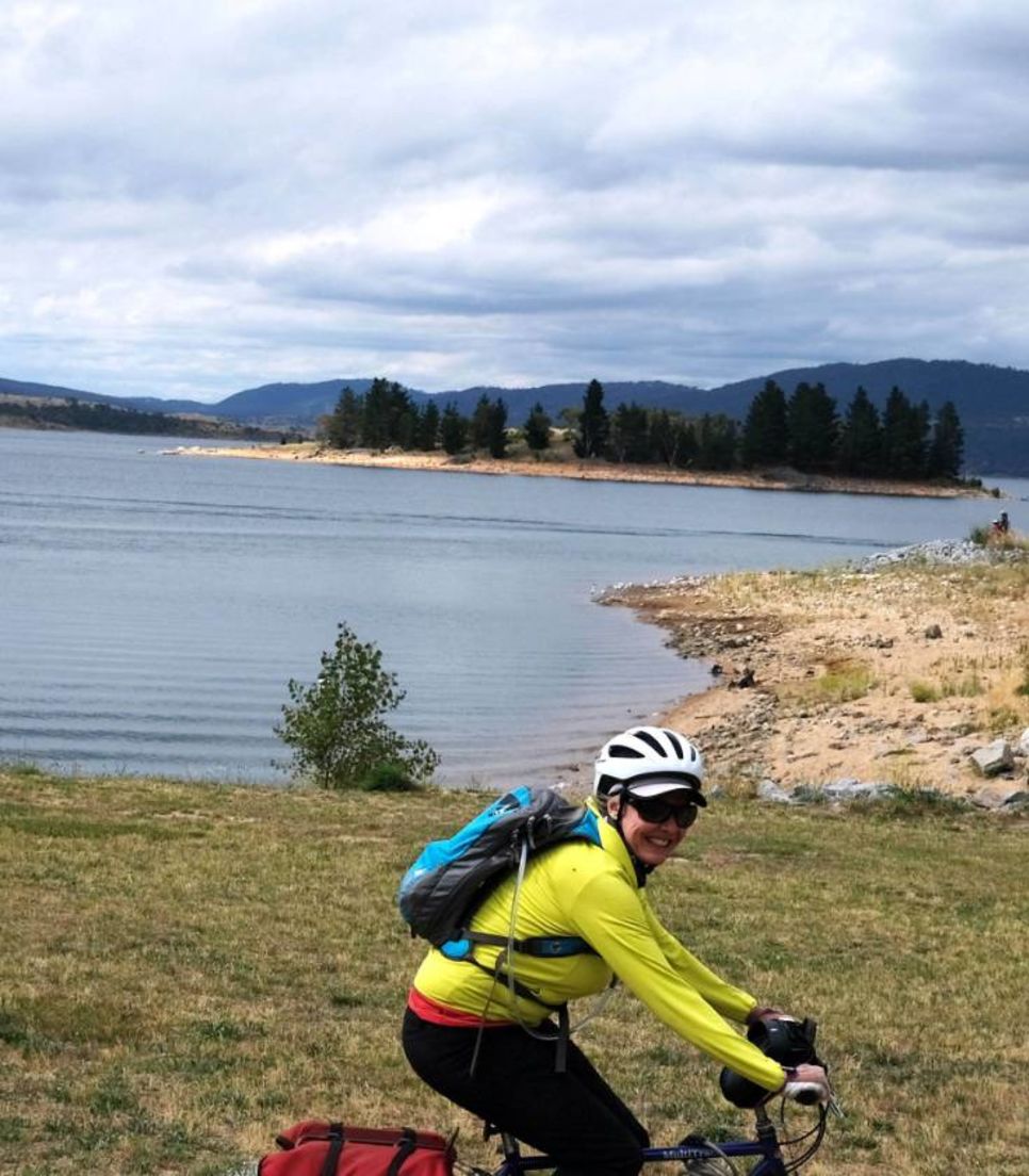 Relish cycling along Lake Jindabyne with its pristine waters and incredible mountain backdrops 