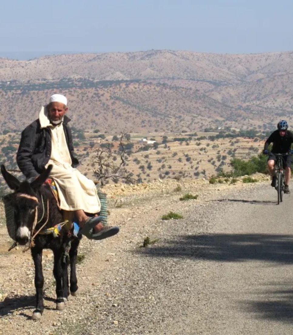 Make the most of your cycling journey and have a glimpse of local life in Morocco