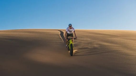 Cycle over sand dunes on fat bikes that have wider tyres