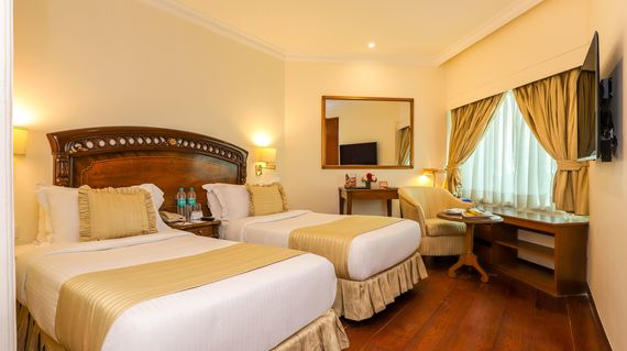 Elegant rooms provide a serene retreat as your Indian exploration begins