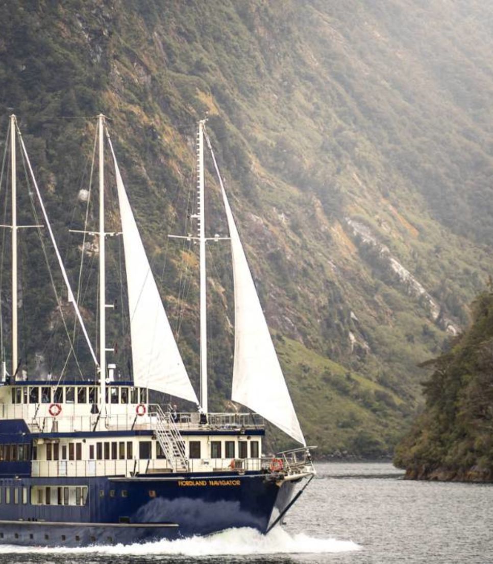 The Fiordland Navigator has spacious viewing decks, a dining saloon with bar, observation lounge and comfortable private cabins with ensuite bathrooms.
