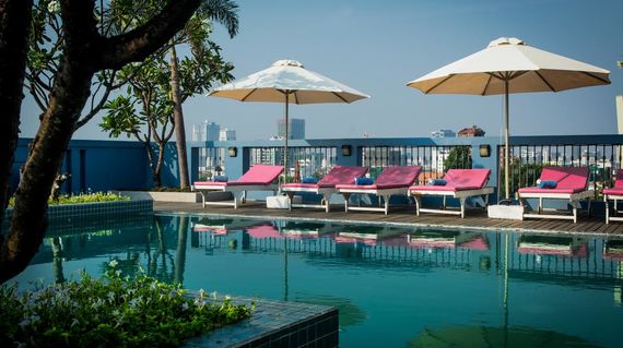 A boutique hotel with a rooftop pool and minutes away from the river front area and Royal Palace.
