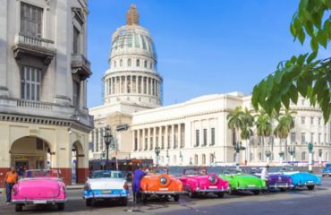 Colorful cars lined up in historic center