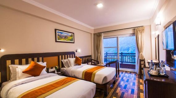 Spend a comfortable night in Pokhara, the gateway to the Annapurna Circuit