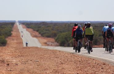 Group of cyclists road riding