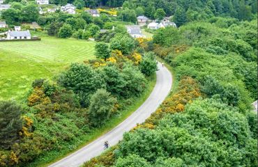 Aerial view of cyclist on rural road