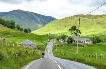 Cyclist on Countryside Road