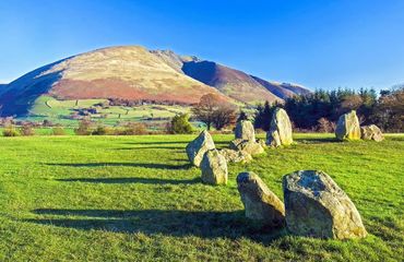 Stone circle with hill in background