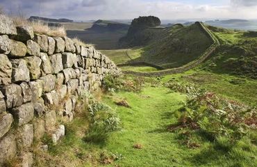 Historic wall through countryside