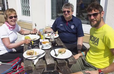 Group eating at outside table