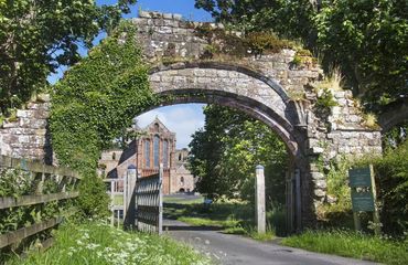 Historic archway in the countryside