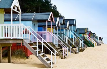 A row of colourful beach huts