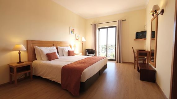 Comfortable rooms await you after a day of activities at this countryside property in Olhão