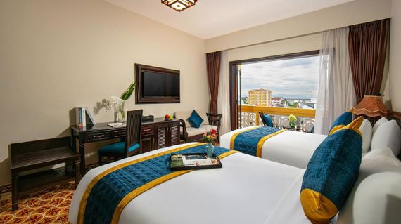 A charming 4-star hotel blending classic elegance with minimalist design, perfectly situated near top attractions, bustling pedestrian streets, and a vibrant night market.