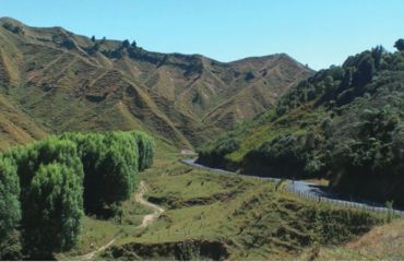 Rural road behind the mountains