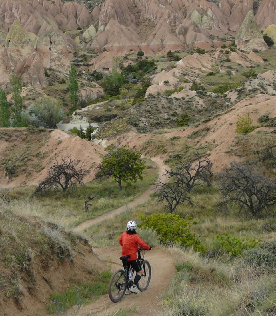 Bike through canyons and mountains in an ancient landscape