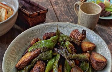 Large plat of food in rustic crockery