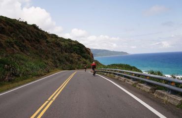 Cyclists on coastal road