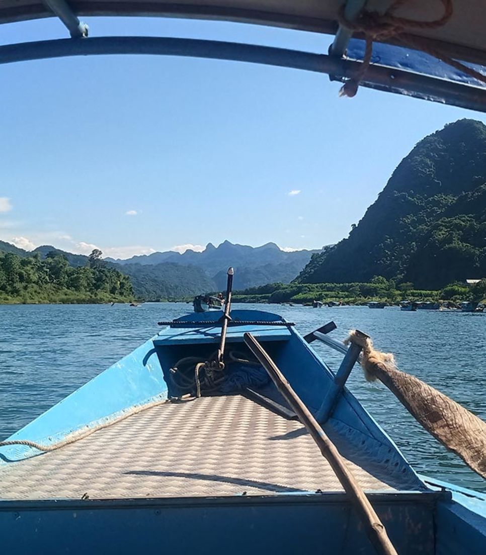 Drift along the Son River to Phong Nha Cave, then explore war relics and stunning cave formations