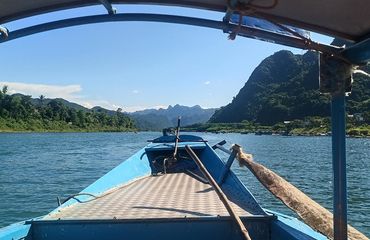 Boat crossing a river