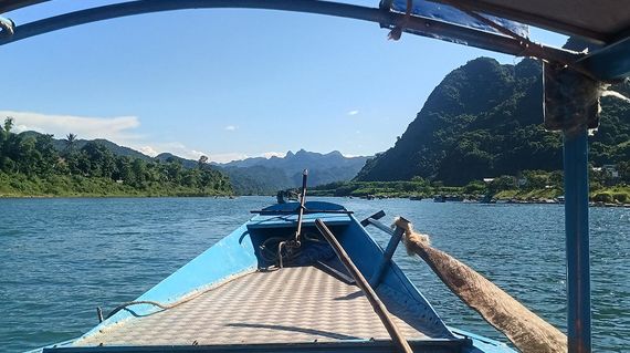 Drift along the Son River to Phong Nha Cave, then explore war relics and stunning cave formations