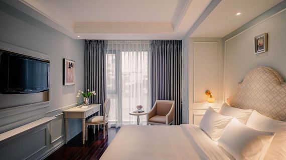 Spend your first night at this comfortable boutique hotel in Hanoi
