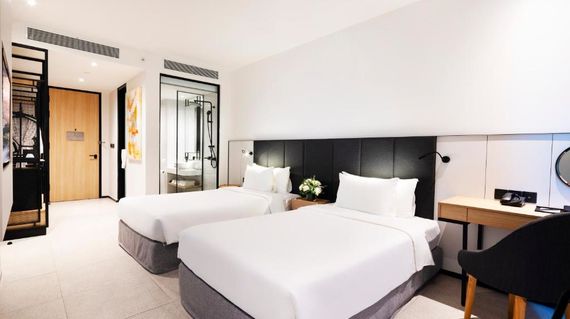 A contemporary hotel with spacious rooms and easy beach access