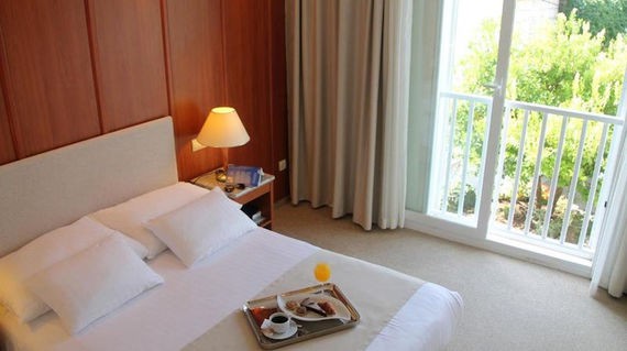 Settle into this elegant hotel for your first two nights