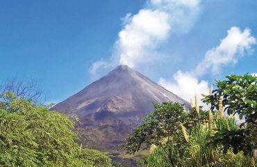 Volcano peak above the trees