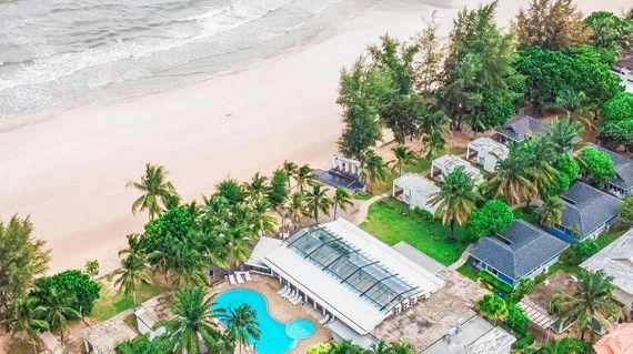 
A relaxed beachfront resort with sea-view rooms and a swimming pool that's perfect for chilling after a cycling day