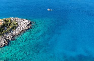Turquoise sea with rugged coastline