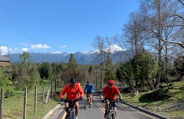 Road cycling with mountains in background