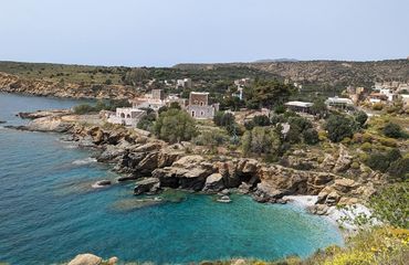 Historic buildings on rocky coastline