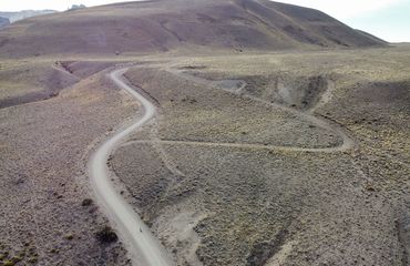 Road curving over mountain