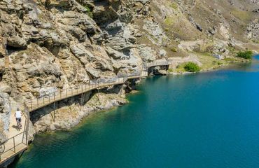 Cycling a trail round turquoise waters