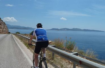 Cyclist riding on coastal road