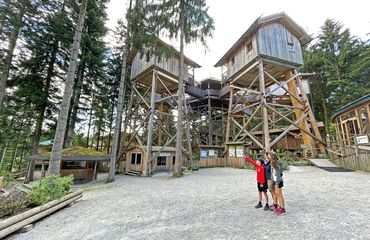 Children looking at wooden structures