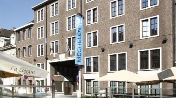 Cap off your days in comfortable accommodations such as NH Mechelen