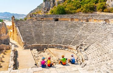 Cyclists sitting in amphitheatre