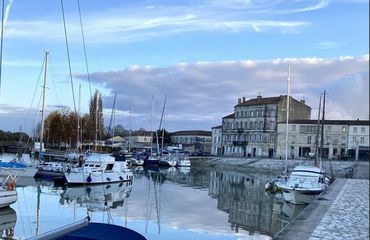 Harbour with historic buildings and yachts