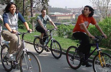 Cyclists in park in Prague